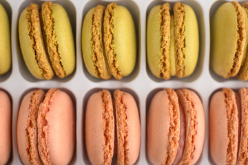 Colored french macaroons, sweets. Sale, assortment.