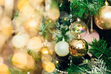 2020 Merry Christmas and New Year holidays background. Blurred bokeh background Christmas tree