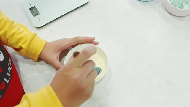 Mixing food colour into cake mix