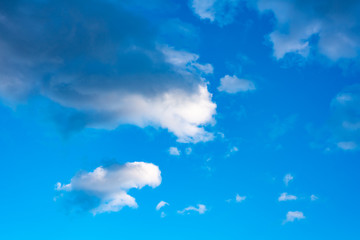 Fototapeta na wymiar Blue sky with white clouds. Blue sky with black clouds.