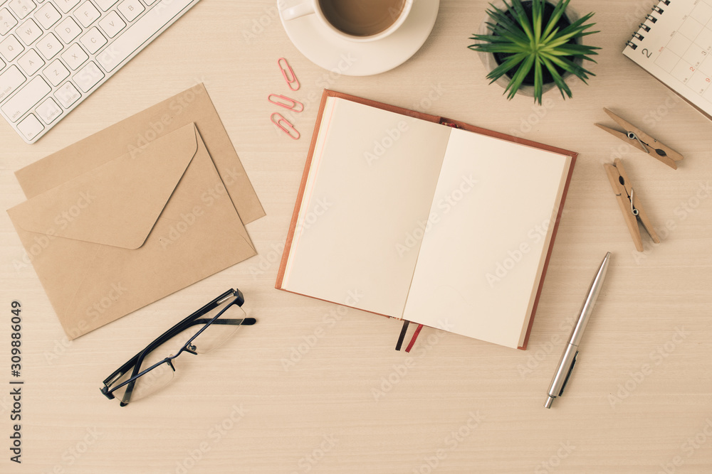 Aufkleber modern desk business working place with glasses,keyboard,pen and notebook on table workspace top vie