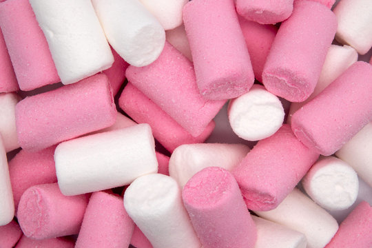 Colorful mini marshmallows macro. Fluffy marshmallows texture and pattern. High Resolution image.