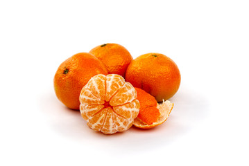 peeled mandarin tangerine clementine segments isolated on white background