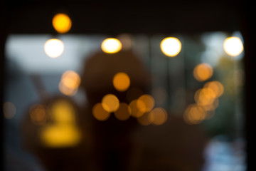 glitter vintage lights background. gold, silver, blue and black. de-focused.