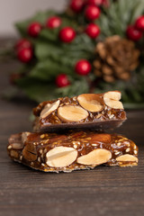 Turron guirlache, Hard nougat made with almond and caramel. Traditional Christmas sweet consumed in...