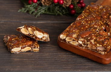 Turron guirlache, Hard nougat made with almond and caramel. Traditional Christmas sweet consumed in Spain.