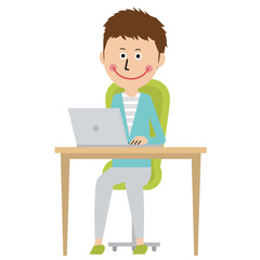 ポップな若い男性　PC操作しながら　笑顔　全身