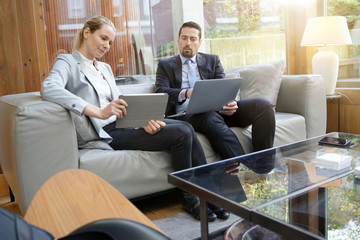 Business people meeting in hotel lounge