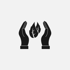 Leaf in hand icon. Vector illustration, flat design