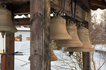 Bells in the bell tower at the Church of the Assumption of the Blessed Virgin Mary in the village of Uspenskoe. Moscow region, Odintsovo city district, Russia.