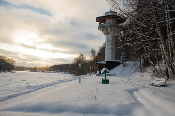 Shore elevator to the river on a cold winter evening
