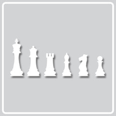 gray icon with white silhouette of chess pieces