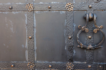Close-up of the old iron black door