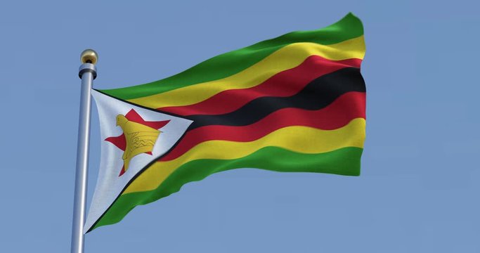 Zimbabwe flag blowing in the wind with blue sky