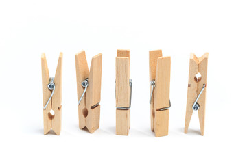 Brown wood clothes peg or clothespin on white background. - Image