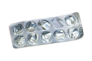 Top view of Pills in blister isolated on white background, Used drugs