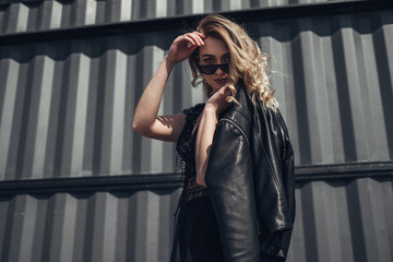 Portrait of Stylish Young Woman in Black Leather Jacket