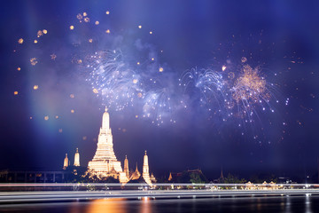Wat Arun temple in bangkok with fireworks. New year and holiday concept. - obrazy, fototapety, plakaty