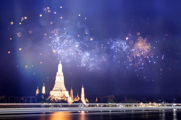 Gordijnen Wat Arun temple in bangkok with fireworks. New year and holiday concept. © erika8213