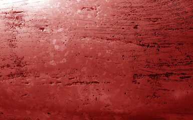 Metal rough surface in red tone.