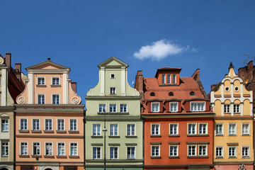 Fototapeta na wymiar Several old historic houses in Wroclaw in Poland and their colorful facades. 