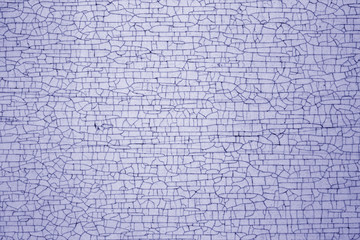 Cracks on metal texture in blue tone.