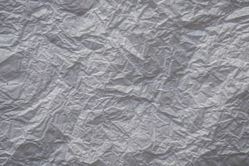 Flat lay, Close-up texture of Crumpled white grey paper background abstract. Detail texture of pattern with free space copy for text.