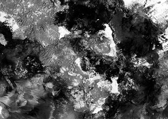 Abstract  black and white background, hand-painted texture, splashes, drops of paint, paint smears. Design for backgrounds, wallpapers, covers and packaging.