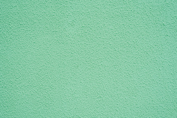 Mint or green plaster wall background