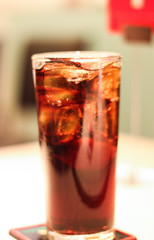 cola grass on the table with blurr background