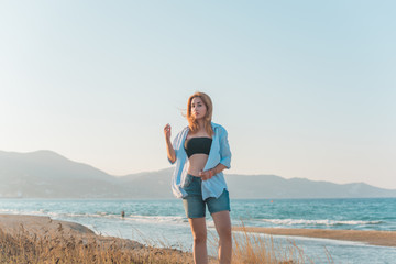 Pretty plus size nice young woman rest at sea, vacation and trip concept