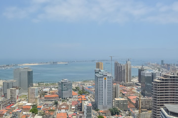 Fototapeta na wymiar Aerial view of downtown Luanda, bay and Port of Luanda, marginal and central buildings, in Angola
