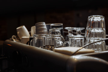 Clean glasses stand in the dark and dry