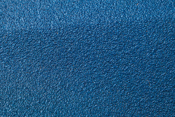 Background of rough paint with a blue texture