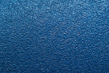 Background of rough paint with a blue texture