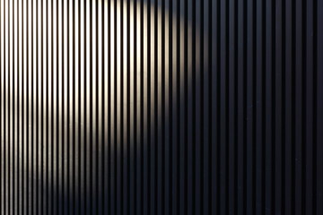 Striped exterior wall and shadow  