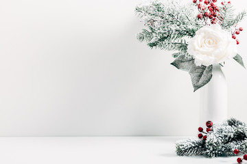Winter or Christmas composition, decoration, flowers, branches in vase on white background....