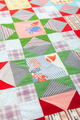 Patchwork, sewing with pieces of fabric, multi-colored segments.