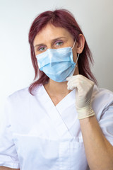 Close up nurse on face bacteriological protection