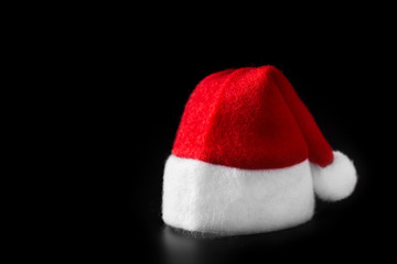 Obraz na płótnie Canvas Santa Claus helper hat isolated on black background
