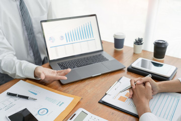 Business People Talking Discussing with coworker planning analyzing financial document data charts...