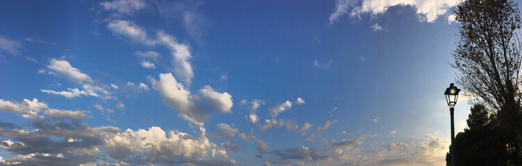 cloudscape and street lamp, Paris, France