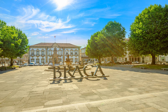 Braga, Portugal - August 12, 2017: City Hall with Braga Sign or logo of city in Praca do Municipio, Braga downtown, North of Portugal. Braga urban cityscape, one of the oldest cities of Portugal.
