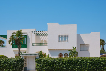 White Arab house with a square balcony in Tunisia.