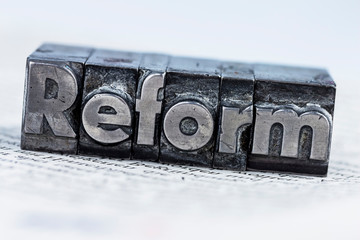 reform written in lead letters