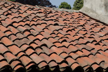 Naklejka premium Roof of an ancient house with ancient and old tiles.