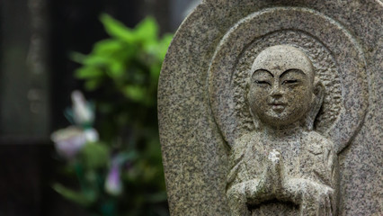 Fototapeta na wymiar Close up on head of buddha statue