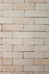white brick block wall . vertical picture .