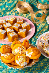 Fototapeta na wymiar Indian Diwali Sweet Food Chandrakala with Sugar Free Dry Fruits, Mung Dal Chakki And Sweet Samosa