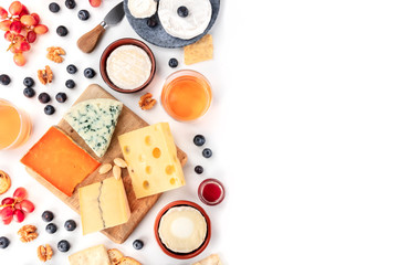 Cheese board background, a flatlay top shot on white with copy space. Blue cheese, red Leicester,...